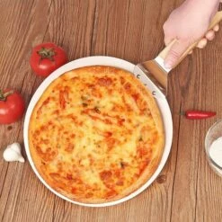 CHANCEY Pelle à Pizza, Palette à Pizza Ronde Avec Poignée En Bois Et Plateau Métallique En Acier Inoxydable Pour Les Pizzas Faites Maison, Les Pâtisseries, La Pâte Etc, 10 Pouces,SEMAket -Four à pizza Soldes 2022 56094539 3